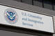 An exterior sign and official seal identify the U.S. Citizenship and Immigration Services. A new report by the National Foundation for American Policy analyzing U.S. Citizenship and Immigration Services data found that the green card backlog has surpassed 1.2 million people.