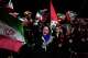 A pro-government demonstrator chants slogan during a gathering in a square in Tehran, Wednesday, Aug. 26, 2026.