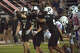 Forsan's Ashton Ellis (21) signals first down after rushing for a gain past the chains against Coahoma in the Howard County Bowl, Aug. 27, 2026, at Memorial Stadium in Big Spring.