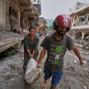 Nepal-China flood survivors reach safe areas as families await news of nearly 3,000 missing