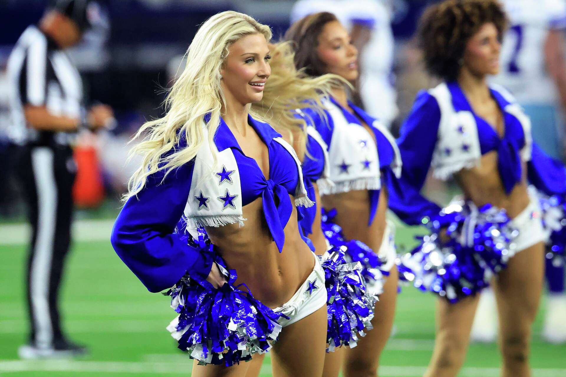 The Dallas Cowboys Cheerleaders perform during a preseason game against the New Orleans Saints at AT&amp;T Stadium in Arlington, Aug. 28, 2026.