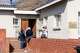 Patients wait outside Mpharane Health Centre in Mohale's Hoek district, Lesotho, Friday, July 10, 2026.