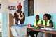 A voter casts her ballot during a referendum on granting new presidential powers, in Bissau, Guinea Bissau, Sunday, Aug. 30, 2026.