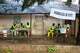 Election officials wait for voters to cast their ballots during a referendum on granting new presidential powers, in Bissau, Guinea Bissau, Sunday, Aug. 30, 2026.