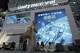 Attendees to the World Robot Conference hang out near the Unitree booth in Beijing, on Aug. 20, 2026.