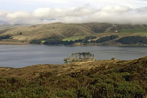 Clouds hang low over Tomales Bay in Marin County, Calif.