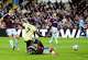 Arsenal's Bukayo Saka (7) scores his side's opening goal during the English Premier League soccer match between Aston Villa and Arsenal in Birmingham, England, Monday, Aug. 31, 2026. (Nick Potts/PA via AP)