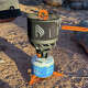 The JetBoil TrailCook combines fast water boiling with enough heat control for simmering, sautéing and other campsite cooking.