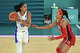 France's #15 Gabby Williams holds the ball in front of USA's #11 Napheesa Collier in the women's Gold Medal basketball match between France and the USA during the Paris 2024 Olympic Games at the Bercy Arena in Paris on August 11, 2024. (Photo by Damien MEYER / AFP via Getty Images)