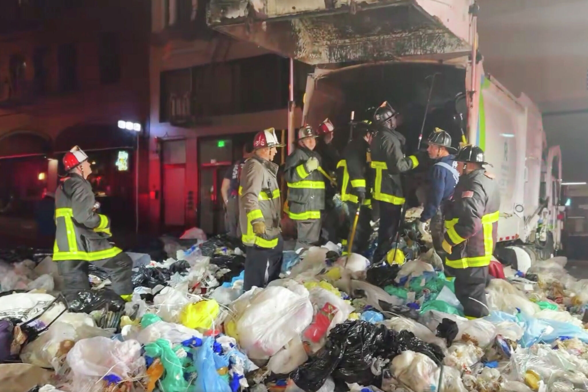 SFFD races to unload entire garbage truck to save trapped person