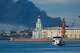 FILE - A plume of black smoke rises over the port of St. Petersburg, Russia, on June 3, 2026, after a Ukrainian drone attack.