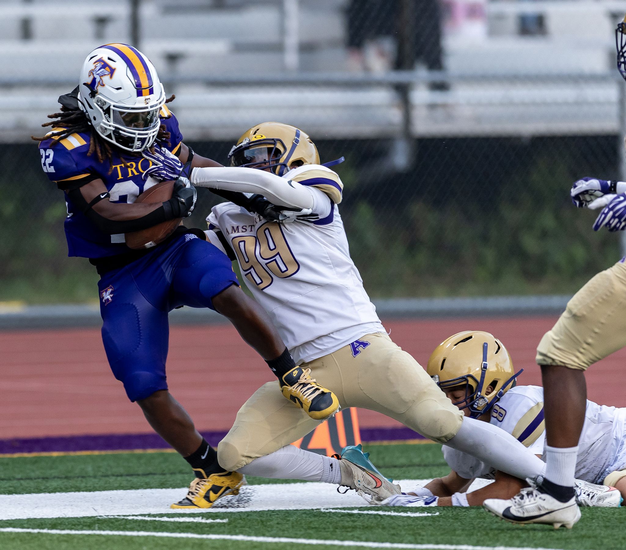 Troy dominates Amsterdam in season opener