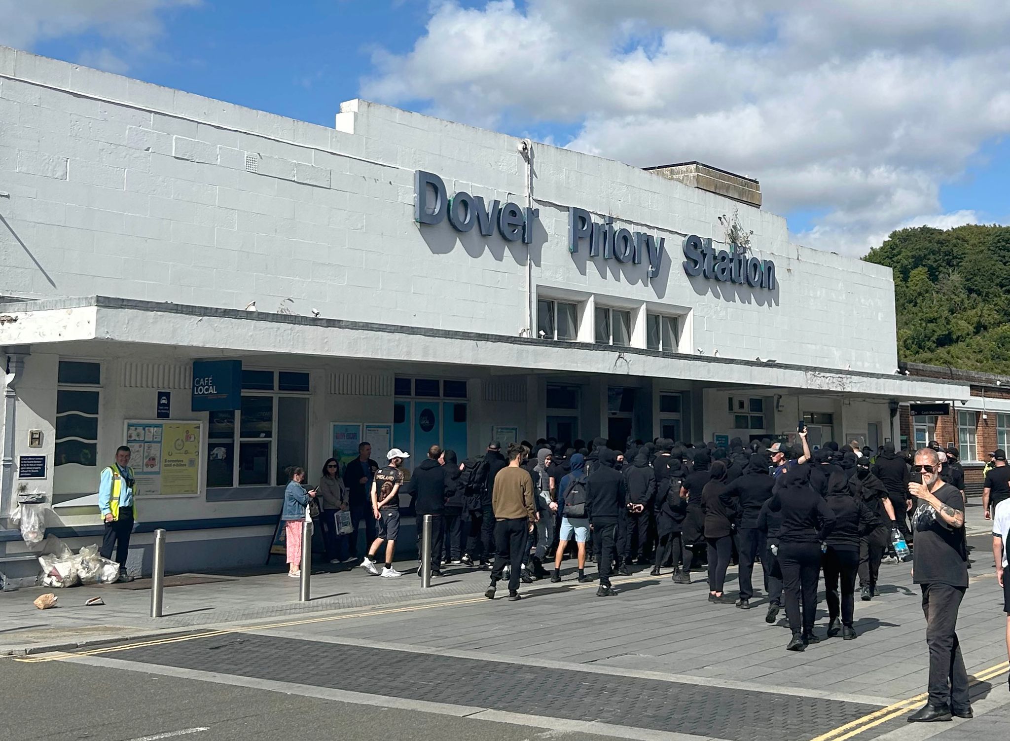 Masked men block roads into Dover port in England in apparent anti-immigrant protest