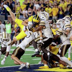 CFP issues statement clarifying how committee can respond to Michigan-Western Michigan result