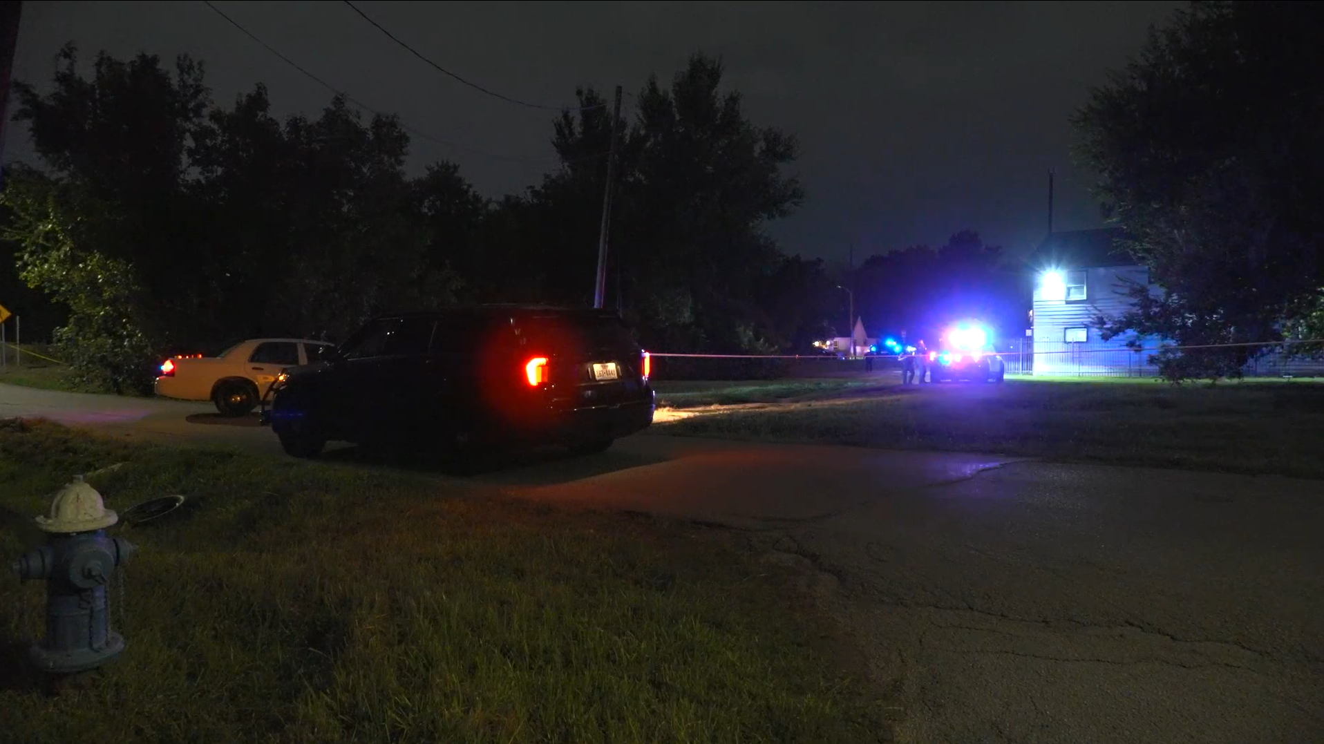 Two people questioned after a body was found in an overturned trash can at Third Ward complex