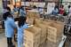 Workers assemble fuel-efficient cookstoves at BURN, a manufacturer of clean cooking appliances, in Kiambu, Kenya, on July 31, 2026.