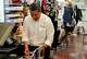 Martin Hernandez III works at Martin Tailors, his family’s longtime tailor shop, in Houston on Tuesday, Sept. 1, 2026. The business, founded by his grandfather Martin Hernandez Sr., has been passed down through three generations of the Hernandez family.