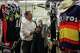 Martin Hernandez III, left, and his grandmother María del Socorro Hernandez work together at Martin Tailors, their family’s longtime tailor shop, in Houston on Tuesday, Sept. 1, 2026.