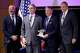 Cox School of Business Dean Todd Milbourn (from left), U.S. Secretary of the Treasury Scott Bessent, SMU President Jay Hartzell and Cox Executive Board Member Ray Washburne pose for a photo following a fireside chat hosted at SMU’s Cox School of Business, September 8, 2026.