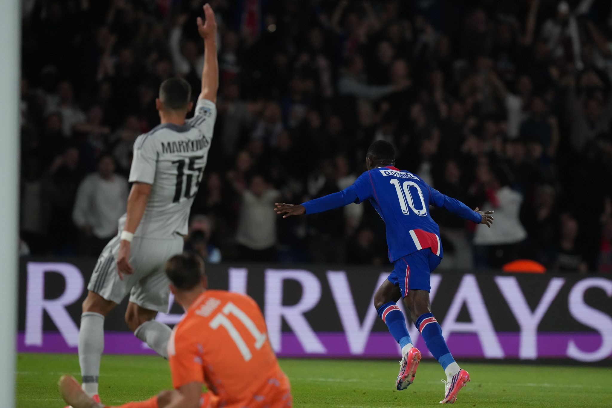 Dembélé roars back to form with 2 first-half goals and an assist against Slovan in Champions League By JEROME PUGMIRE , AP Sports Writer