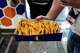 A man walks away with nachos during the Republican convention at the American Airlines Center in Dallas, Wednesday, Sept. 9, 2026.