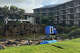 The Riptide Shave Ice & Snacks shack is seen floating in a lagoon after it was pummeled by Hurricane Lowell, on Tuesday, Sept. 8, 2026, in Poipu on Kauai.