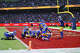 Quentin Lake of the Los Angeles Rams celebrates with teammates after an interception in the second quarter of the NFL football game against the San Francisco 49ers at the Melbourne Cricket Ground on Sept. 11, 2026 in Melbourne, Australia.