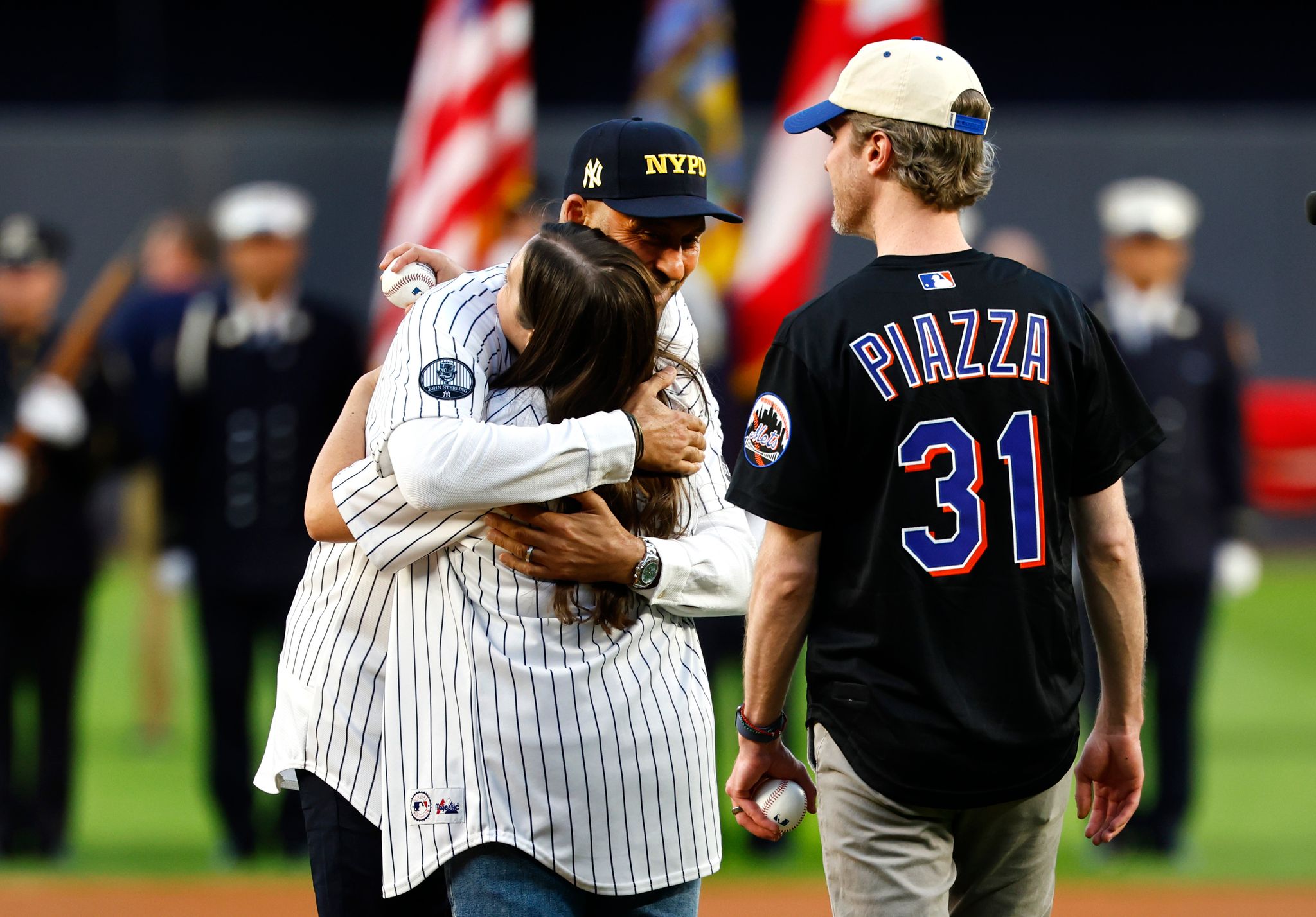 Daughter of 9/11 victim throws out first pitch as Yankees mark 25th ...