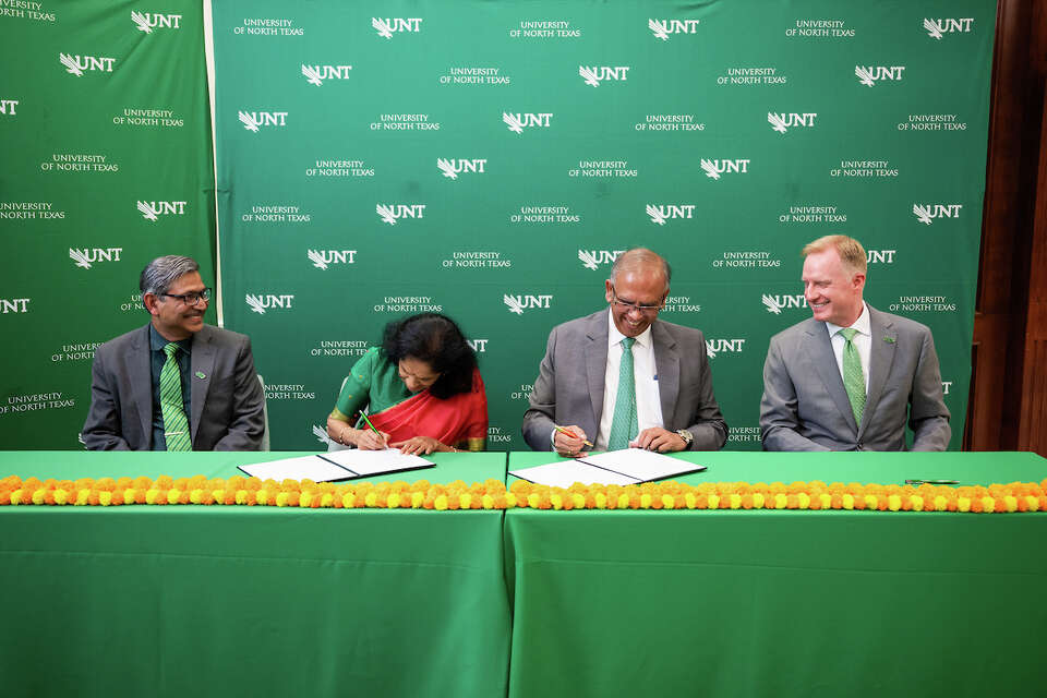 Vikas and Anu Sinhas celebrate with UNT administration and community members as it is announced they are contributing a gift to the university on September 2, 2026. (Pete Comparoni / UNT)