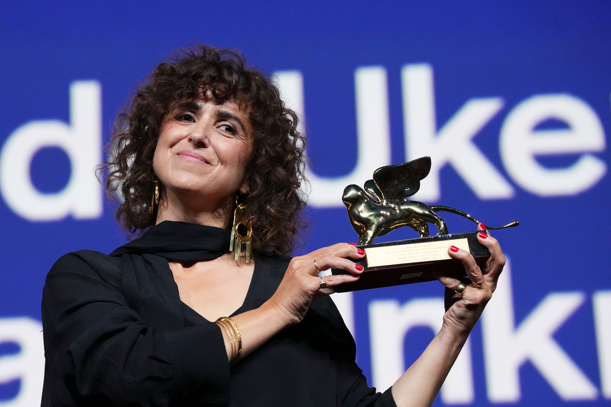 'Woman Unknown' wins Golden Lion, Malkovich 'humbled' by best actor award at Venice Film Festival