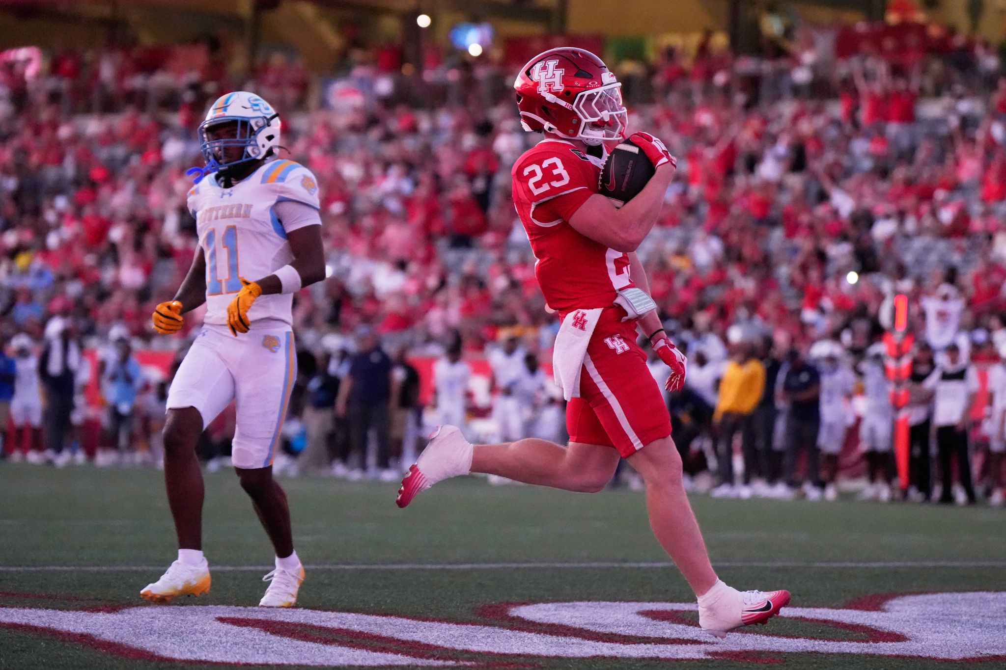 No. 22 Houston routs Southern 77-6 in game played briefly without stadium lights