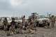 This image taken from undated video released by the Ansar Allah Media Office, the media arm of Yemen's Houthi rebels, on Saturday, Sept. 12, 2026, shows Houthi fighters chant after praying beside military vehicles during what the group says was their advance against Saudi-backed forces at an undisclosed location in southern Yemen. (Ansar Allah Media Office via AP)
