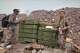 This image taken from undated video released by the Ansar Allah Media Office, the media arm of Yemen's Houthi rebels, on Saturday, Sept. 12, 2026, shows Houthi fighters inspecting what the group says is an abandoned position during their advance against Saudi-backed forces at an undisclosed location in southern Yemen. (Ansar Allah Media Office via AP)