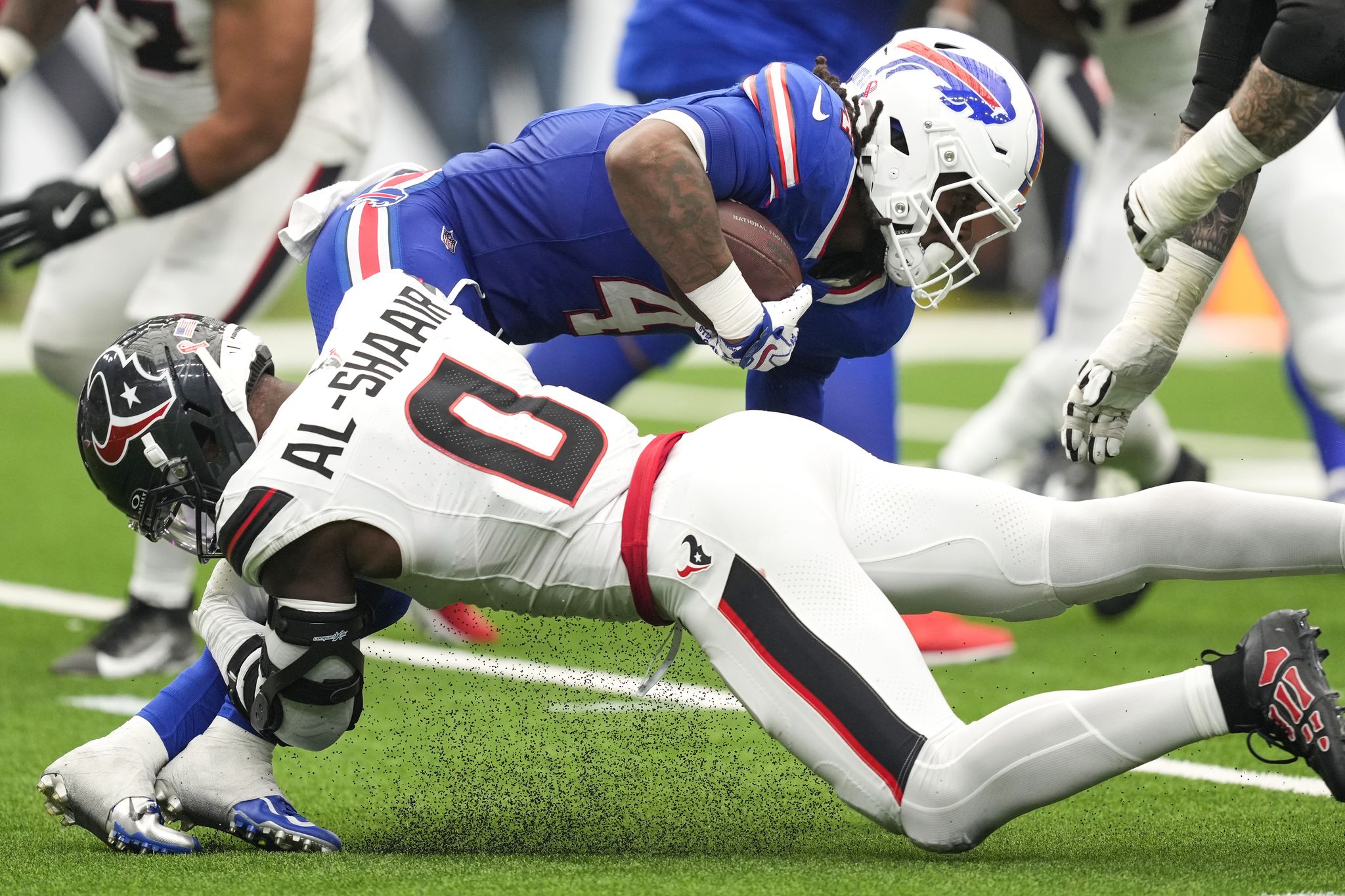 Photo: Houston Chronicle NFL Fines Azeez Al-Shaair for Palestinian Tribute on Eye Black
