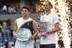Ben Shelton, of the United States, left, and Alexander Zverev, of Germany, right, pose for a photo together with their trophies after Zverev won the men's singles final of the U.S. Open tennis championships Sunday, Sept. 13, 2026, in New York.