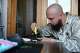 A 28-year-old digital content marketer who recently moved out of Russia is seen in Tbilisi, Georgia, Saturday, Sept. 5, 2026. He asked not to be identified because of security concerns.