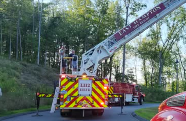 Firefighter hit by car driving through East Hampton crash scene, fire chief says
