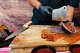 Omar Mejía preps pancita roja tacos at Barbacoa Mejía inside the Richmond Flea Market on Saturday, Sept. 5, 2026.
