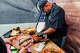 Omar Mejía preps three different types of barbacoa with his daughter Vivian at Barbacoa Mejía inside the Richmond Flea Market on Saturday, Sept. 5, 2026.