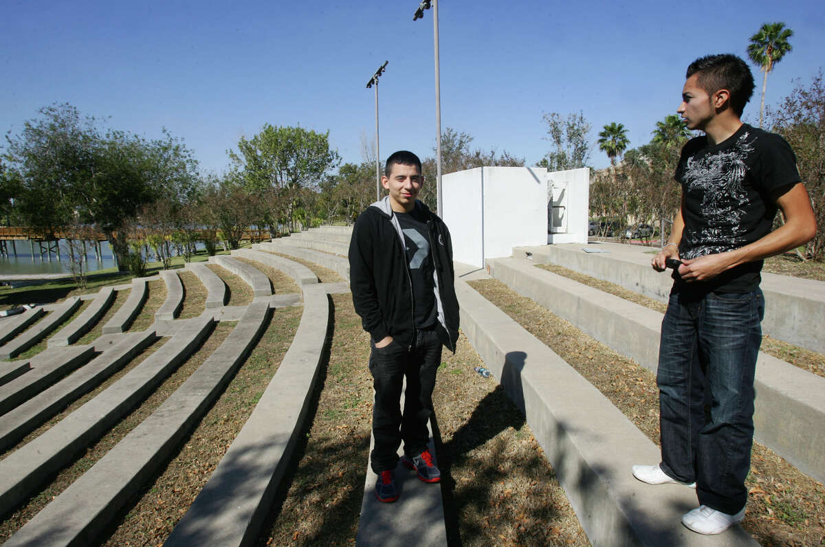 UT-Brownsville students Hector Liceaga, 19 (left), and Raul Gonzalez, 18, talk about the way the violence across bordering Mexico has affected their campus.