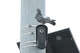 A pigeon rests atop a Flock Safety camera, which is mounted high on traffic signal pole at the intersection of Chapman Avenue and Harbor Boulevard in Garden Grove, Calif., on Aug. 14, 2026.