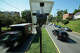 Traffic flows past an Axon-brand automatic license plate reader in the median of 16th Street near the border of Maryland and the District of Columbia in Silver Spring, Md., on Aug. 19, 2026.