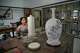 Chinese porcelain artist Chen Qing paints a vase in Jingdezhen, in eastern China's Jiangxi province, Tuesday, Sept. 1, 2026.