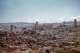 A view of the urban skyline of downtown San Francisco on a sunny day, likely taken from Coit Tower, 1950.