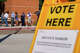 Voters in the Dallas-Fort Worth area wait in line to cast their ballots.