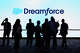 Attendees stand by a sign displayed at Salesforce’s Dreamforce conference on Sept. 15, 2026, in San Francisco.