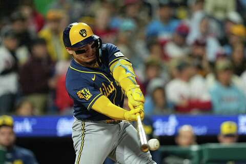 William Rourke Yelich and Turang homer as Brewers win 99th game and slow Phillies ...
