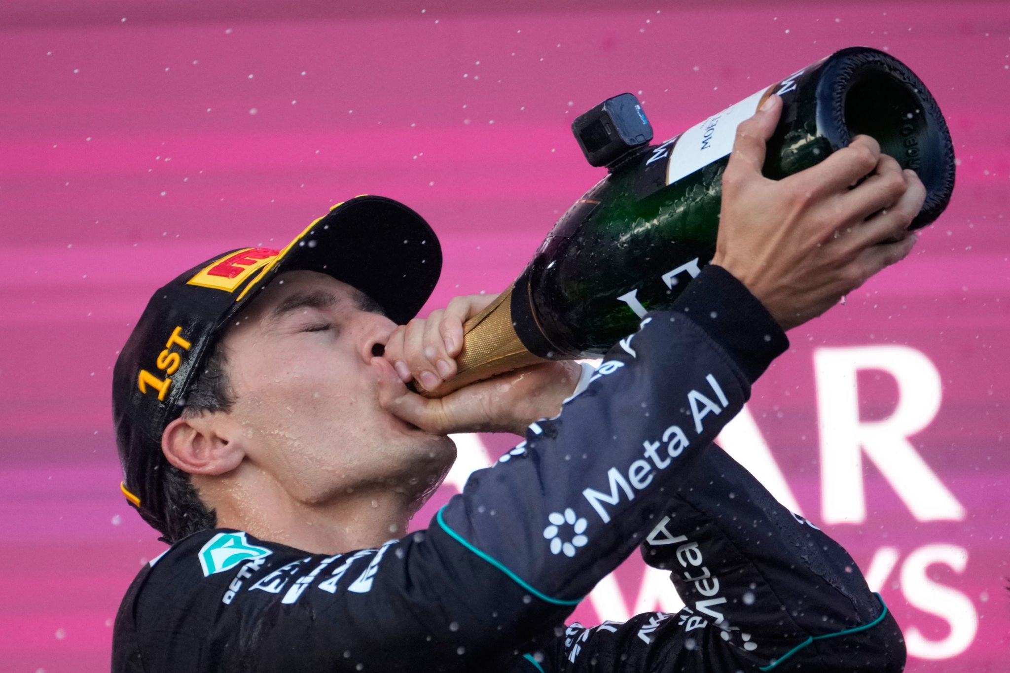 George Russell holds off Verstappen in close finish in Azerbaijan to ...