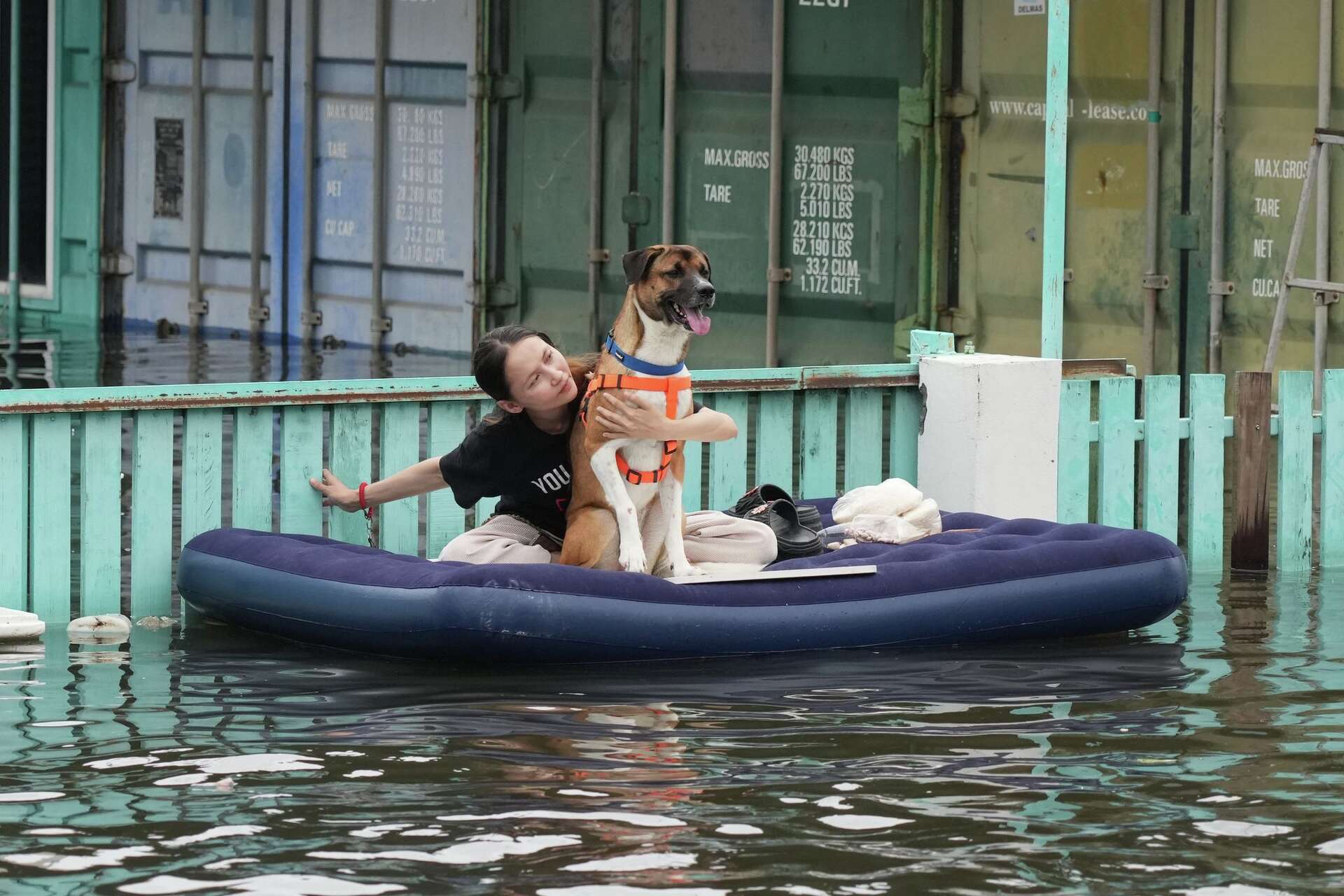 36 Man Raft Photos show people navigating Bangkok’s flooded streets during days of ...