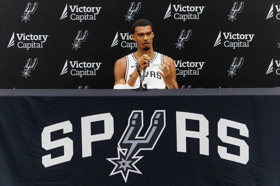 San Antonio Spurs’ Victor Wembanyama answers questions from reporters during the NBA basketball team’s media day at the Victory Capital Performance Center in San Antonio, Monday, Sept. 28, 2026.